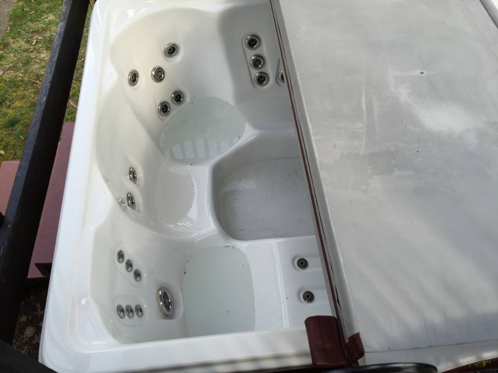 If the hot tub was drained, why is there water in it?